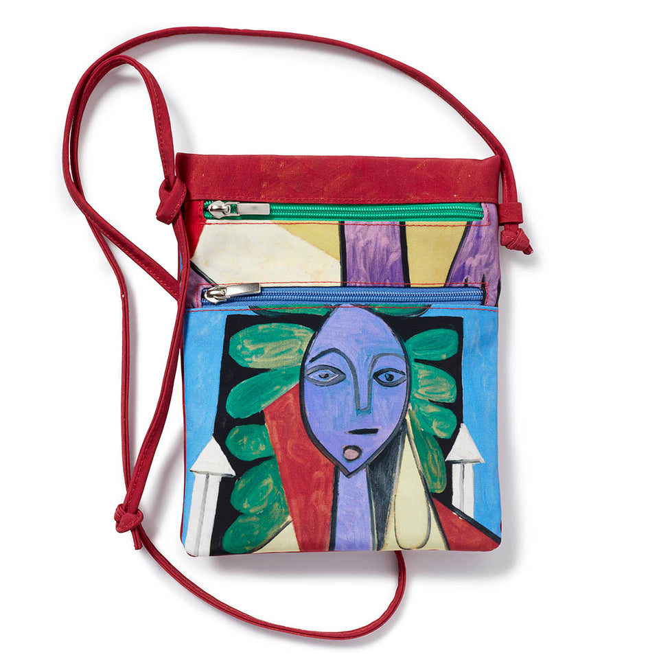 Bolso Bandolera Mujer en un sillón